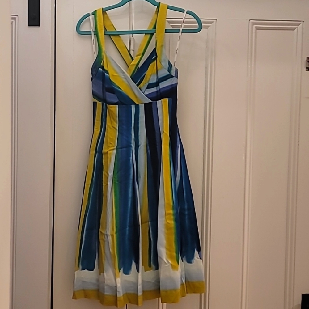 Womens size 4 Calvin Klein cross back , v cut front, fit and flare dress